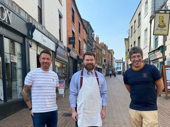 Three Banbury business owners or managers who are looking toward a positive future for the town centre. From left: Elliott Don, manager of Union Menswear, Barry Whitehouse, owner of the Banbury art supplies shop - The Artery, and Mark Allitt, owner of Revival MK2 clothing store.