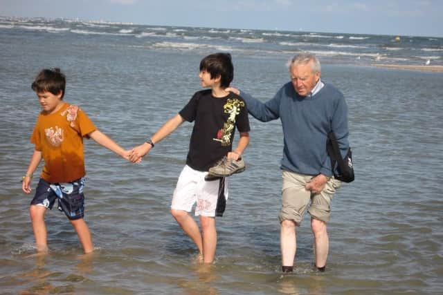 Lord Saye and Sele with two of his grand-sons, Ivo and Guy, in 2010 at the beach at Courseulles-sur-Mere where he and the 8th Battalion Rifle Brigade landed on D-D plus 6 in 1944