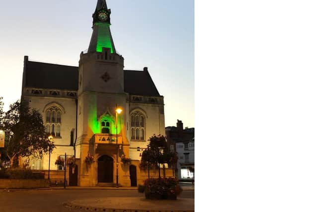 Banbury town hall glowed green on Monday (September 21) to boost awareness for waste recycling and sustainability.