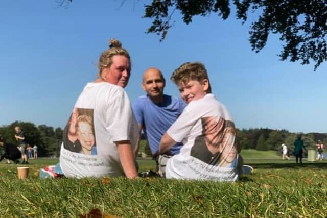 Liz Holland, and her 11-year-old son, Charlie, with family friend, Dan Buda, who helped train Liz and Charlie for their 5k fundraising challenge to in memory of Jason Holland, Liz's husband and Charlie's father