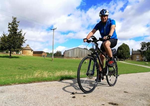 David Moore from near Banbury is taking on a 300-cycle challenge to benefit the Cancer Research UK charity
