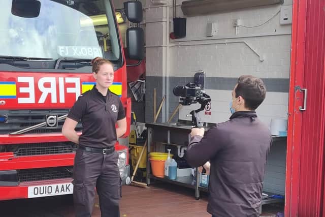 Amy Gamble (ladies captain) from Northamptonshire Fire & Rescue Service being filmed for the BT Sport programme at Deddington Fire Station