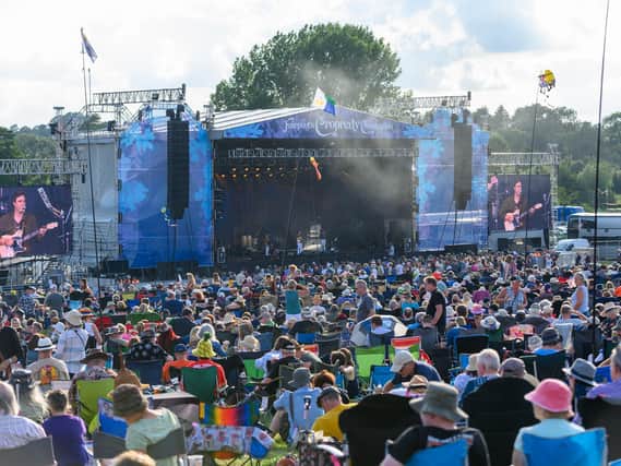 Fans watch Tors perform at Fairport's Cropredy Convention in 2019. Photo by David Jackson