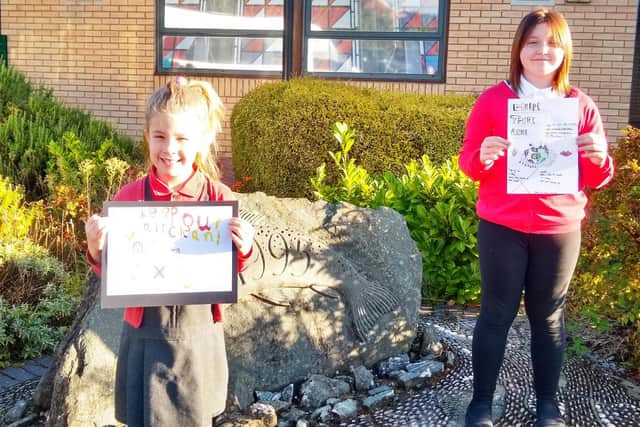 Two of the winners of the Clean Air Day poster contest - Gracie Freeman,aged 9, and WiktonaPlantier,aged 6, both from St Leonard's Primary School. (photo from Extinction Rebellion Banbury and the school)