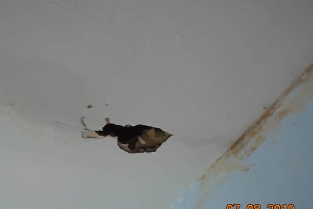 A collapsing ceiling, filthy facilities, and an abandoned car are among the dangerous defects that have seen a Banbury landlord receive financial penalties totalling £20,000. (photo from Cherwell District Council)