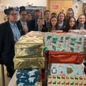 Students from North Oxfordshire Academy with teacher Alexandra Wilkinson who packed 77 shoeboxes last year