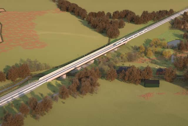 An artist's impression of an aerial view of the HS2 line with its viaduct going over Banbury Lane at Thorpe Mandeville