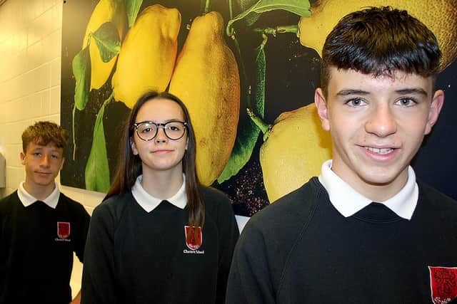 Chenderit School students, Jake ODonnell (at the back), Isabella Hetherington and then Alfie Aspinall, who are volunteering with The Porch charity.