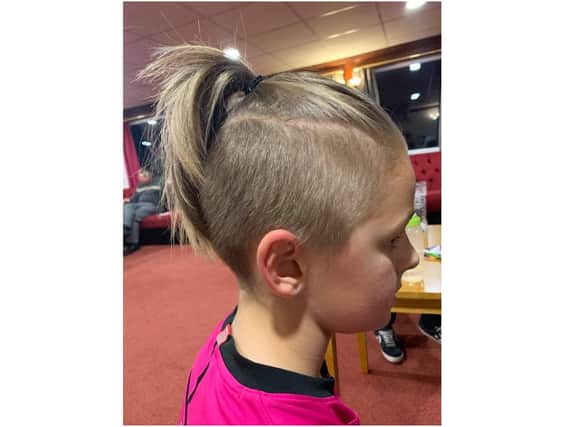 Nine-year-old Harry Horton will have his head shaved with his father, Michael Horton and family friend, Warren Nicholl, on Sunday November 1 to benefit Macmillan Cancer Support