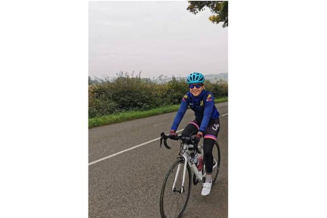 Hayley Holland, aged 22, will take on a 100-mile cycle challenge next week to help the NHS charity