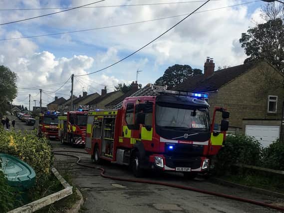 Four fire appliances tackled the house fire that has left a Fritwell family in temporary accommodation