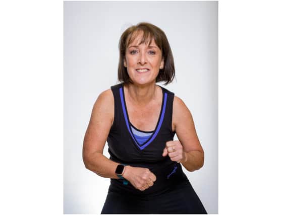 Michele Mannion, who raised £300 for charity through donations she received after she ran a free 'Groove Lite' exercise class in town. (Photo by Gareth Sowerby)