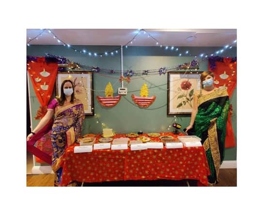 Staff and residents from the Glebefields Care Home in Banbury, including Billie Cook and Emily Sweetingham celebrate Diwali (photo from Glebefields Care Home)