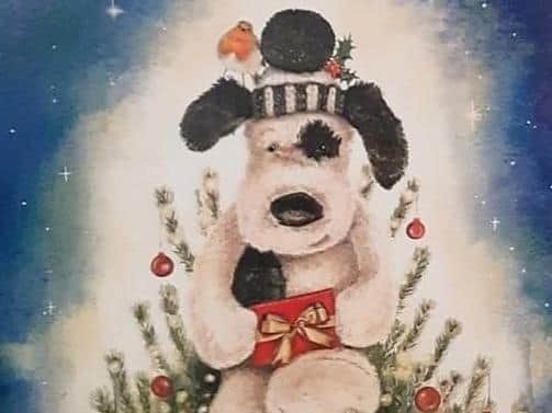 The Christmas card, featuring Freddie Croft's favourite cuddly toy Mutty, which will raise funds for bone cancer research