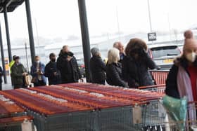 Shoppers queueing to get into the new Sainsbury's supermarket in Brackley.