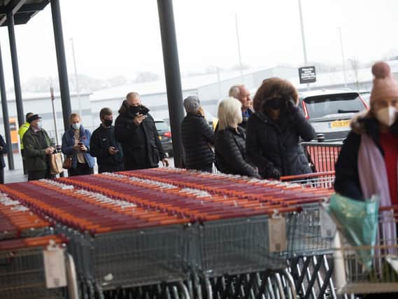 Shoppers queueing to get into the new Sainsbury's supermarket in Brackley.