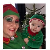 Stephanie Silver and her five-month-old son Niko in their elf outfits.