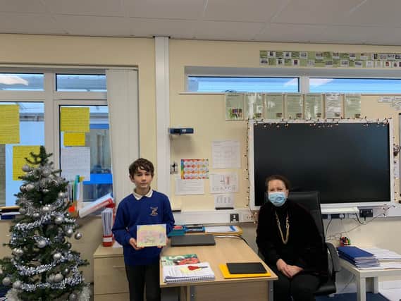 North Oxfordshire’s MP Victoria Prentis visited Queensway Primary School and announced Nicholas Watts, 10, as the winner of her Christmas card competition