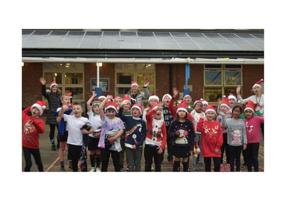 Pupils at Hanwell Fields Community School in Banbury donned Santa’s hats on Friday December 4 and ran in aid of Katharine House Hospice in Adderbury.