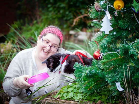 Katie Harrison and her foster cat Brandy from the BARKS charity (photo by photo Jannine Paxton-Timms of JPT Photographic)