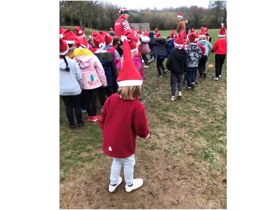 Pupils from Bloxham Primary School raised £750 for the Katharine House Hospice during their Santa Fun Run