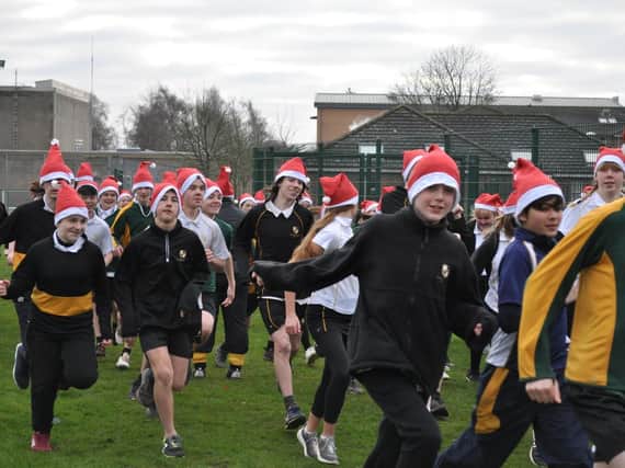 Students from Chipping Norton School take part in the Santa Fun Run to benefit Katharine House Hospice (photo from Katharine House Hospice)