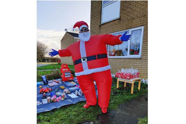Prabhu Natarajan dressed as Santa and spent six hours on Saturday December 19 dancing and giving away toys and bags of sweets to children in a Banbury neighbourhood.