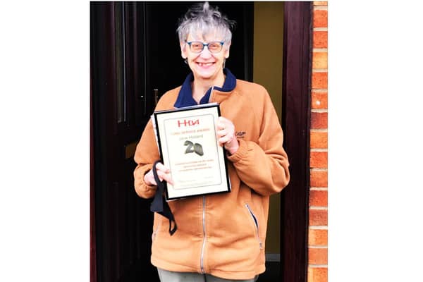 Jane Holland receives her long service certificate for 20 years from the Hospital Broadcasting Association (HBA) (photo from Radio Horton)