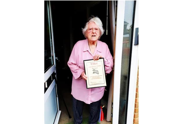 Honorary Member of Radio Horton, Ray Kent receives her long service certificate for 20 years from the Hospital Broadcasting Association (HBA) (photo from Radio Horton)