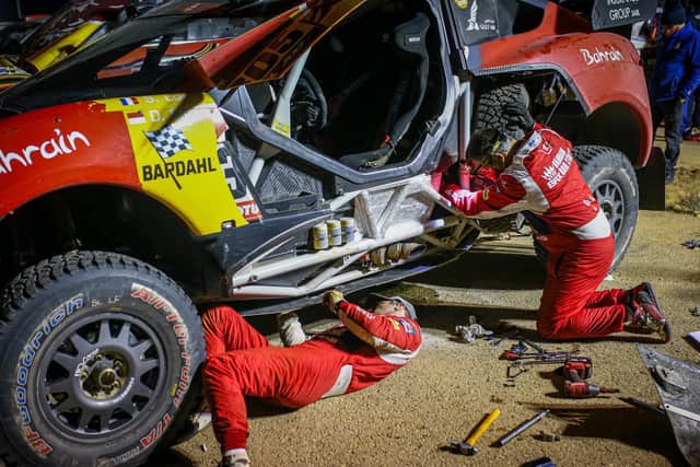 Sebastien Loeb and co-driver Daniel Elena must make their own repairs during the marathon element of the Dakar Rally 2021