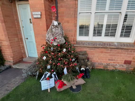 A poppy and veterans themed Christmas tree in Warwick Road, Kineton
