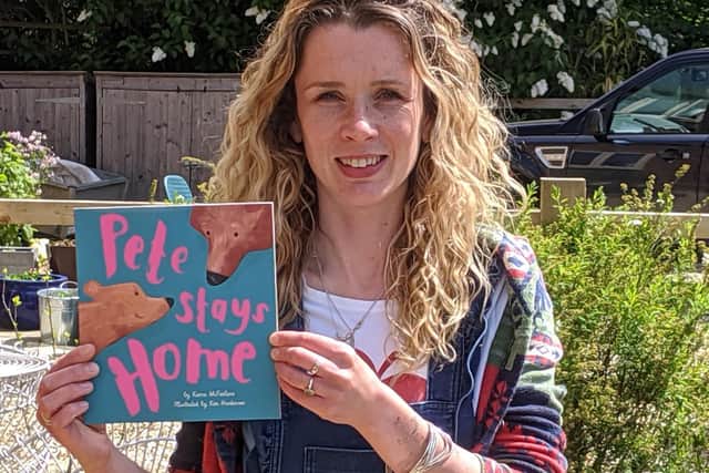 Author Karra McFarlane, pictured last lockdown with her new book, Pete Stays Home