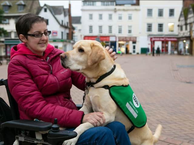 Banbury woman Karen Williams with her Dogs for Good assistance dog Iggy. (photo from Dogs for Good charity)