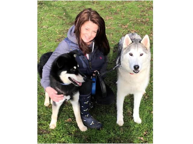 Claire Evans, with her two dogs, who has launched the group - The Pet Bank - in Banbury to help families struggling to care for their pets