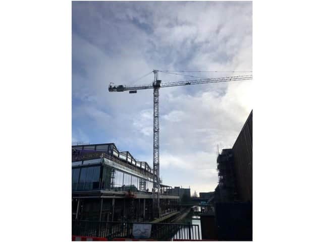 Castle Quay Waterfront reaches new construction milestone with crane removal