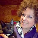 BARKS charity chair Ann Collins with a kitten on its way to a new home (photo from BARKS charity)