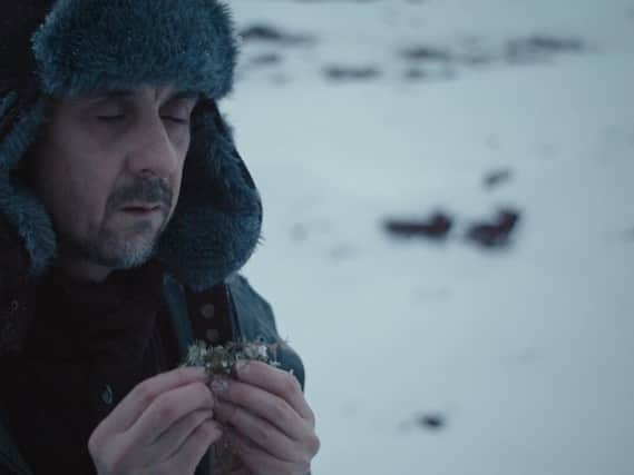 Tim Plester on set in the frozen landscape of Iceland