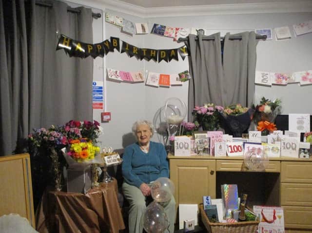 Mary Collier with her birthday cards marking her 100th birthday at the Glebefields care home in Drayton, Banbury (photo from Glebefields care home)