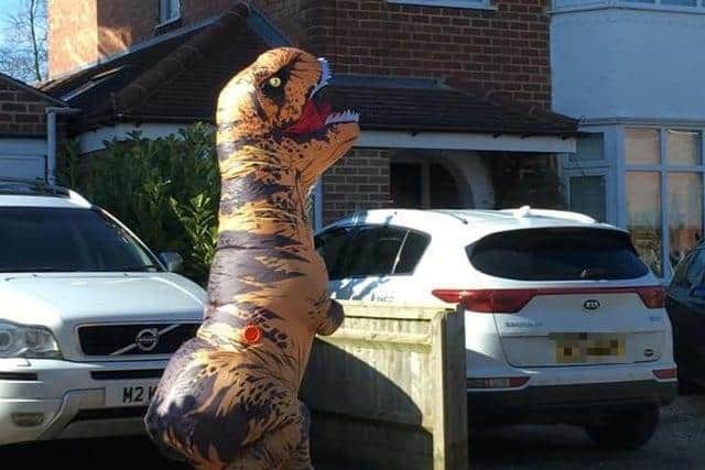 Gemma Whitton-Dews danced in a giant dinosaur costume last year to help people smile in her Banbury neighbourhood