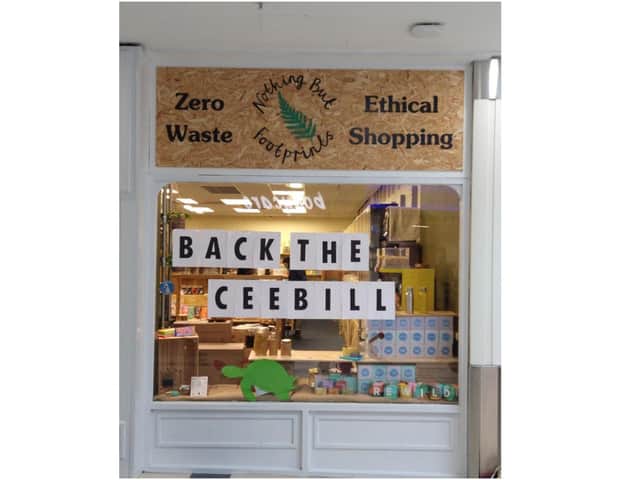 Banbury Quakers and members of Banbury Extinction Rebellion joined together in a national call for MPs to support the Climate and Ecological Emergency Bill (CEE Bill). Banner hung outside the business Nothing but Footprints in Castle Quay.
