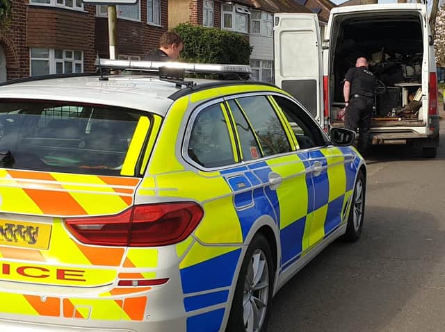 Image of police working with community safety officers to seize a vehicle in Banbury (Image from the Cherwell District Council Community Safety Team Facebook page)