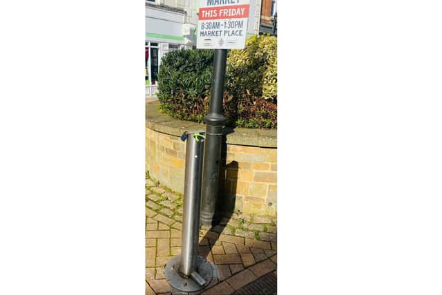 One of several hand sanitiser stations placed around the town centre by Cherwell District Council