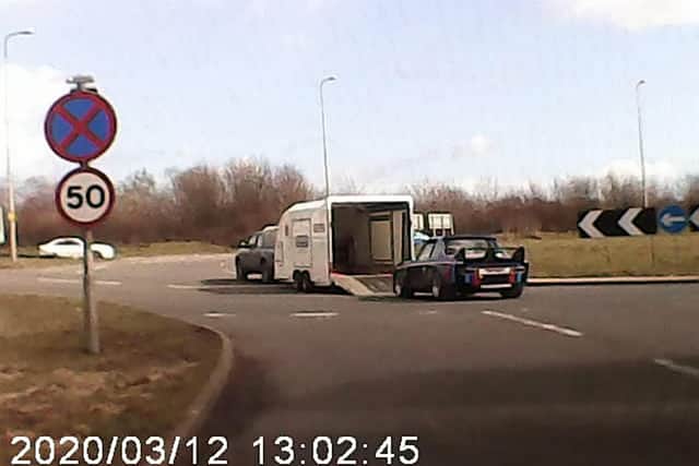 Andrew Jackson was coming off the M40 at Cherwell Valley when his dashcam captured the moment the car left the white trailer as it approached a roundabout.