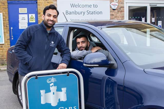 Drivers - Adnan Ghafoor and Imran Hussein - with Castle Cars who are offering free transport for OAPs in Banbury town