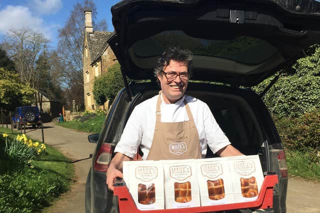 Mark Woodgate, owner of Mark's Cotswold Bakery, with a tray of freshly baked hot crossbuns in South Newington ready to deliver to the Horton.
