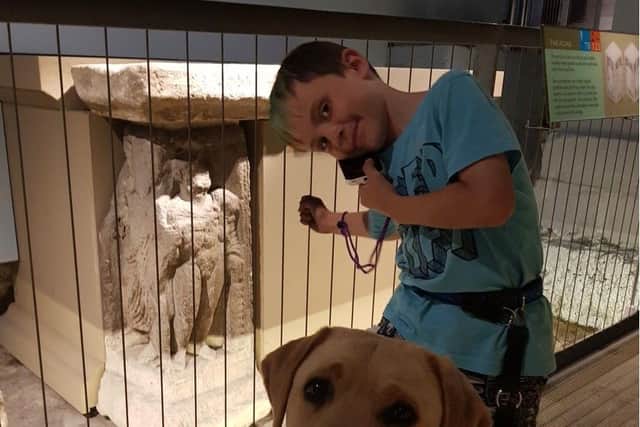 Ty and his assistance dog Denby