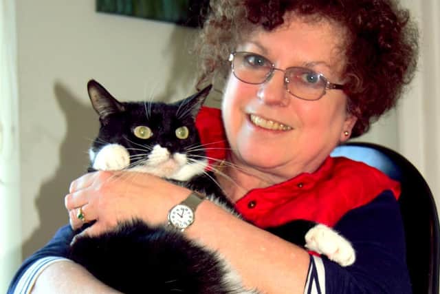 BARKS chair Ann Collins with rescue cat, Jesse