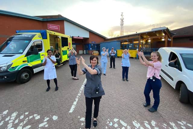 Horton staff and emergency services workers are pictured during Thursday's clapathon outside A&E