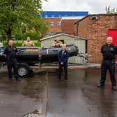 Northamptonshire Fire and Rescue Service powerboat has been named Captain Tom in honour of a celebrated NHS fundraiser.