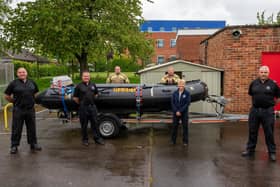 Northamptonshire Fire and Rescue Service powerboat has been named Captain Tom in honour of a celebrated NHS fundraiser.